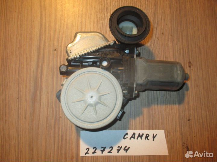 Моторчик стеклоподъемника задний левый