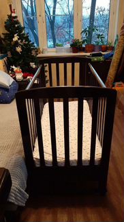 Детская кроватка маятник