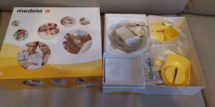 Молокоотсос Medela mini electric