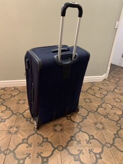 Чемодан на колесах samsonite