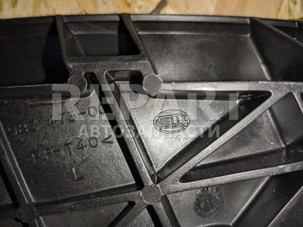 Кронштейн фары Nissan Tiida C11